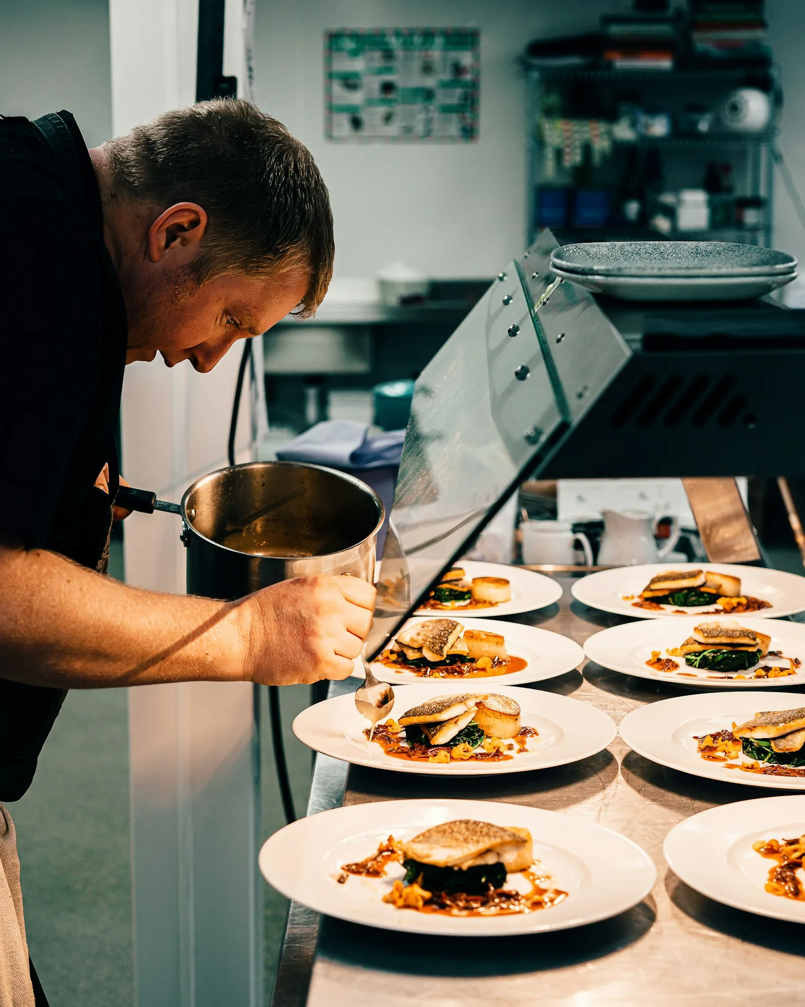 Chef preparing ingredients in a restaurant kitchen